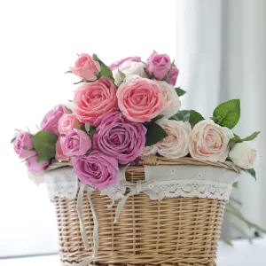 rtificial roses, pink roses, white roses, floral arrangement, wicker basket, lace tablecloth, home decor.