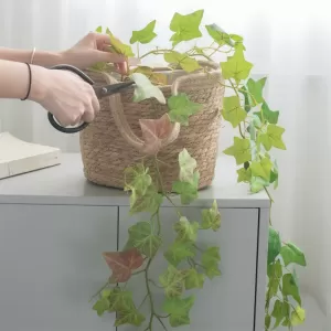 Artificial ivy vine in woven basket for natural home decor
