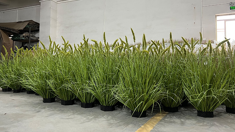 Artificial grass plants in a factory