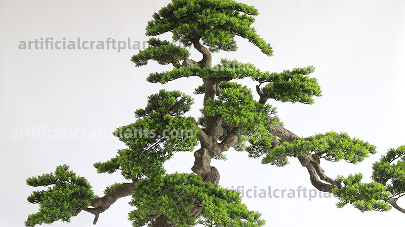 fake bonsai plant close-up of artificial bonsai tree with green foliage