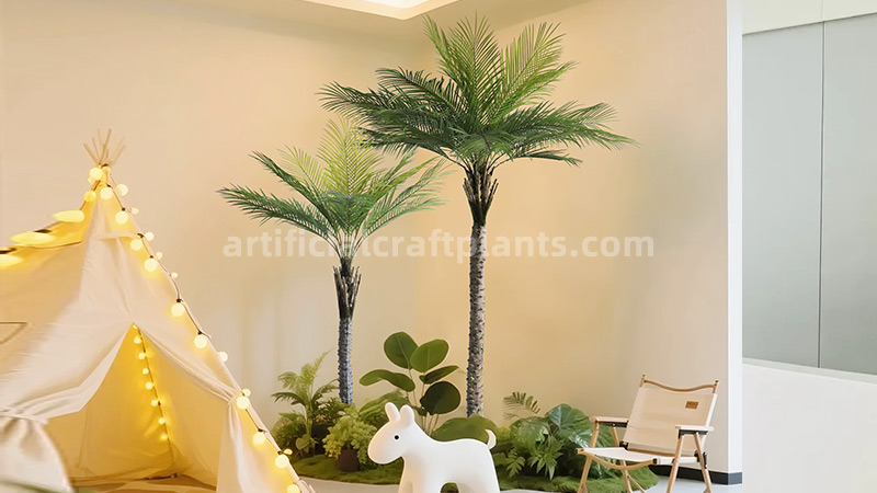 Artificial palm trees in a cozy indoor space