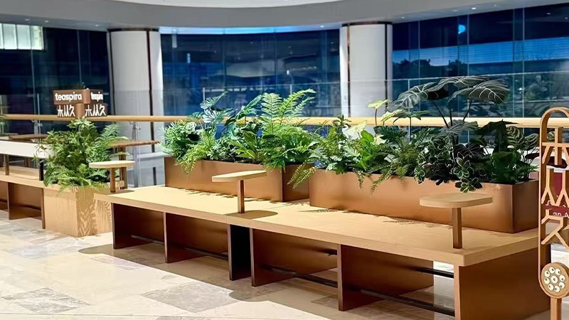 Artificial Ferns large artificial fern and tropical plants in a wooden bench planter