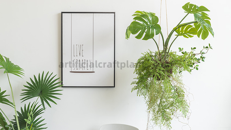Artificial Hanging Plants Artificial hanging basket with monstera and fern plants for home decor.
