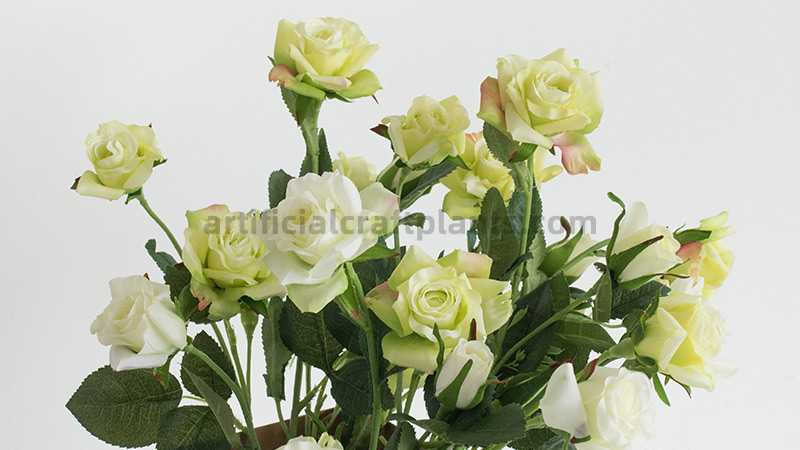 Artificial Roses Decor Pink and white artificial roses in a modern living room setting.