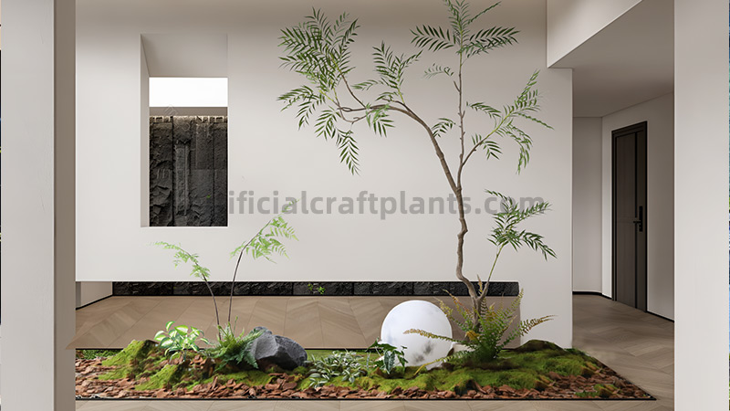 Artificial succulent plant in a glass pot on white pebbles.