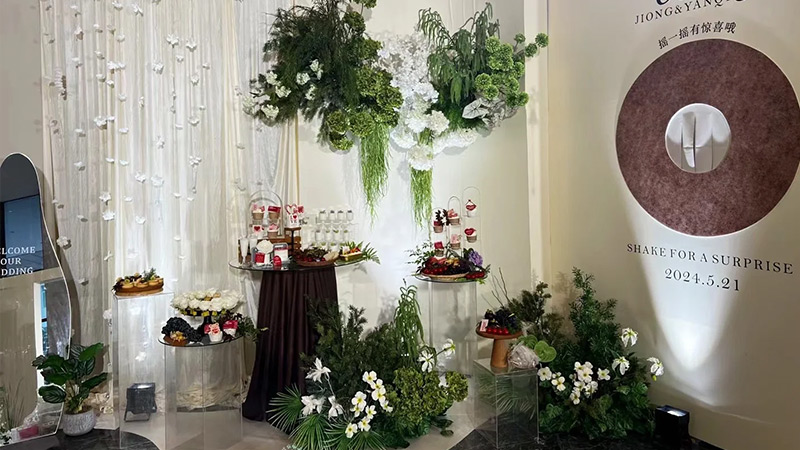 Artificial Wedding Florals large artificial floral wall and decorative plants for a wedding event
