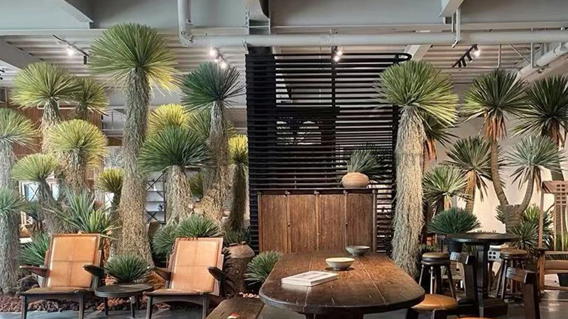 Artificial Yucca Plants large artificial yucca plants decorating a rustic-style room