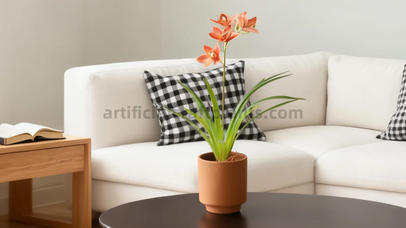 Artificial orange orchid plant Orange artificial orchid on a coffee table in a modern living room
