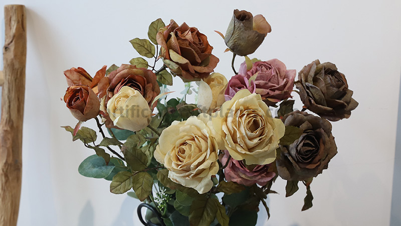 Artificial vintage rose bouquet Close-up of a bouquet of artificial roses in vintage, muted colors