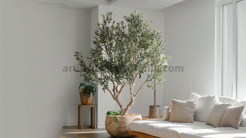 Faux Olive Tree Artificial olive tree in a bright living room