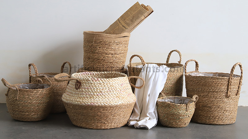Woven Rope Baskets Various hand-woven rope and straw baskets for storage and planters.